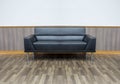 Black leather sofa set in the living room Royalty Free Stock Photo