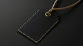 Black Leather Tag with Gold String on Dark Background Royalty Free Stock Photo