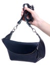 Black leather waist bag in hand Royalty Free Stock Photo