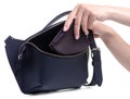 Black leather waist bag and purse in hand Royalty Free Stock Photo