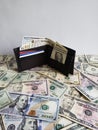 black leather wallet with american dollars bills Royalty Free Stock Photo