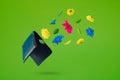 Black leather wallet with colorful flowers flying on a green background. Positive news, thinking and energy concept. Optimistic