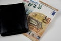 Black leather wallet and euro bills Royalty Free Stock Photo