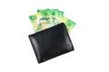 Black leather wallet with swiss francs on white background Royalty Free Stock Photo