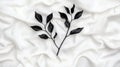 Black Leaves on White Silk Royalty Free Stock Photo