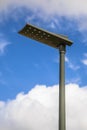 Black LED street light blue sky Royalty Free Stock Photo