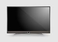 Black LED tv television screen blank on white wall background Royalty Free Stock Photo