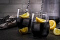 Black lemonade with ice and lemon Royalty Free Stock Photo