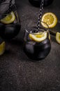 Black lemonade with ice and lemon Royalty Free Stock Photo