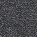 Black Leopard Print Seamless Texture. Seamless pattern of black leopard spots on a textured background Royalty Free Stock Photo