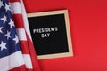 black letter board with text president day and American flag on red background. top view Royalty Free Stock Photo