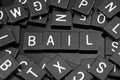 Black letter tiles spelling the word & x22;bail& x22; Royalty Free Stock Photo