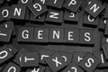 Black letter tiles spelling the word & x22;genes& x22;