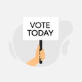 Black lettering Vote Today. The hand holds a flag, a sign with an inscription. Vector illustration. Royalty Free Stock Photo
