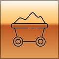 Black line Coal mine trolley icon isolated on gold background. Factory coal mine trolley. Vector Illustration