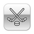 Black line Ice hockey sticks and puck icon isolated on white background. Game start. Silver square button. Vector Royalty Free Stock Photo