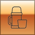 Black line Thermos container and cup icon isolated on gold background. Thermo flask icon. Camping and hiking equipment Royalty Free Stock Photo