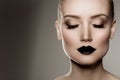 Black lips. Halloween Makeup. Luxury beautiful woman with dark l