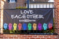 A Black Lives Matter banner attached on the metal fence outside historic Christ Church.