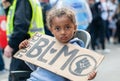 Black Lives Matter child protester at Hyde Park, London. Royalty Free Stock Photo