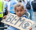 Black Lives Matter child protester at Hyde Park, London. Royalty Free Stock Photo