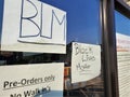 Black Lives Matter handwritten signs in business window