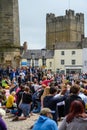 Black Lives Matter protesters kneeling on the cobbles of Richmond Marketplace in front of Richmond Castle, while angry Counter