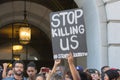 Black lives matter protestors holding a poster during march on C