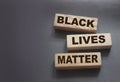 Black lives matter words on Wooden building blocks on black background. Stop racism concept Royalty Free Stock Photo
