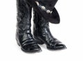 Black Lizard Cowboy Boots and Hat with Concho Hatband. Royalty Free Stock Photo