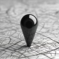 Black location pin marker on abstract map with intricate details