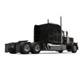 Black long haul semi - trailer big truck - back view Royalty Free Stock Photo