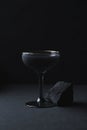 Black on Black Luxury Cocktail with Activated Charcoal and Black Vodka Royalty Free Stock Photo
