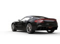 Black luxury sports car on white background - rear view