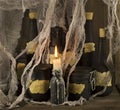 Black magic bottles with candle Royalty Free Stock Photo