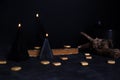 Black magic ritual with candles and runes Royalty Free Stock Photo