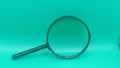 a black magnifying glass isolated on a solid teal background. Royalty Free Stock Photo