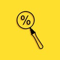 Black Magnifying glass with percent discount icon isolated on yellow background. Discount offers searching. Search for