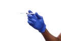 Black male hand in blue glove holding a plastic syringe Royalty Free Stock Photo