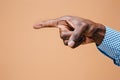 Black male hand point finger. Hand gestures - man pointing on virtual object Royalty Free Stock Photo