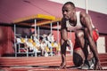 Black male runner with a purposeful look ahead at the start Royalty Free Stock Photo