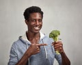 Black man with broccoli Royalty Free Stock Photo