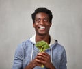 Black man with broccoli Royalty Free Stock Photo