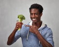 Black man with broccoli Royalty Free Stock Photo