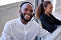 Black man, call center and office portrait with smile, communication and customer service. Happy crm expert, contact us Royalty Free Stock Photo