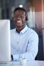 Black man, call center and portrait by computer with smile, typing and customer service in office. Crm expert Royalty Free Stock Photo
