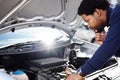 Black man, car breakdown and confused with engine problem in road with doubt, auto repair service insurance and travel Royalty Free Stock Photo