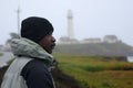 Black Man At the Coast On A Foggy Day