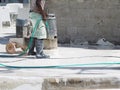 worker produces the grout and finish wet concrete in outside with a special tool for smoothing and polishing concrete floors.