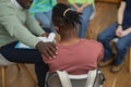 Black man crying in support group circle and sharing story Royalty Free Stock Photo